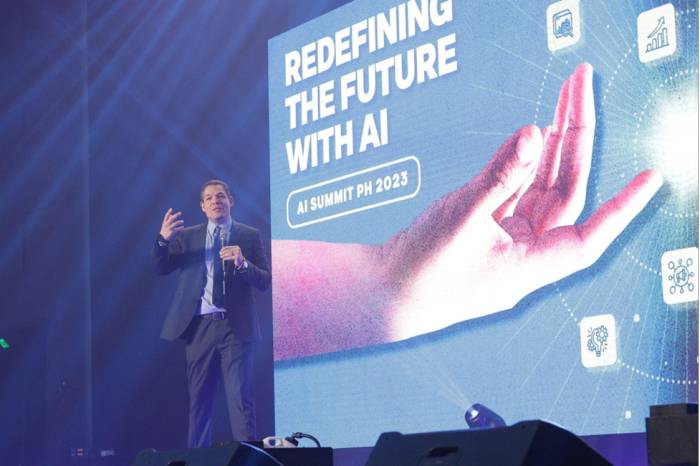 ACTION FOR A COLLECTIVE PURPOSE. ADI CEO Dr. David R. Hardoon inspires the crowd with a call to action for AI- driven business transformation and sustainable growth, marking the end of a successful event.
